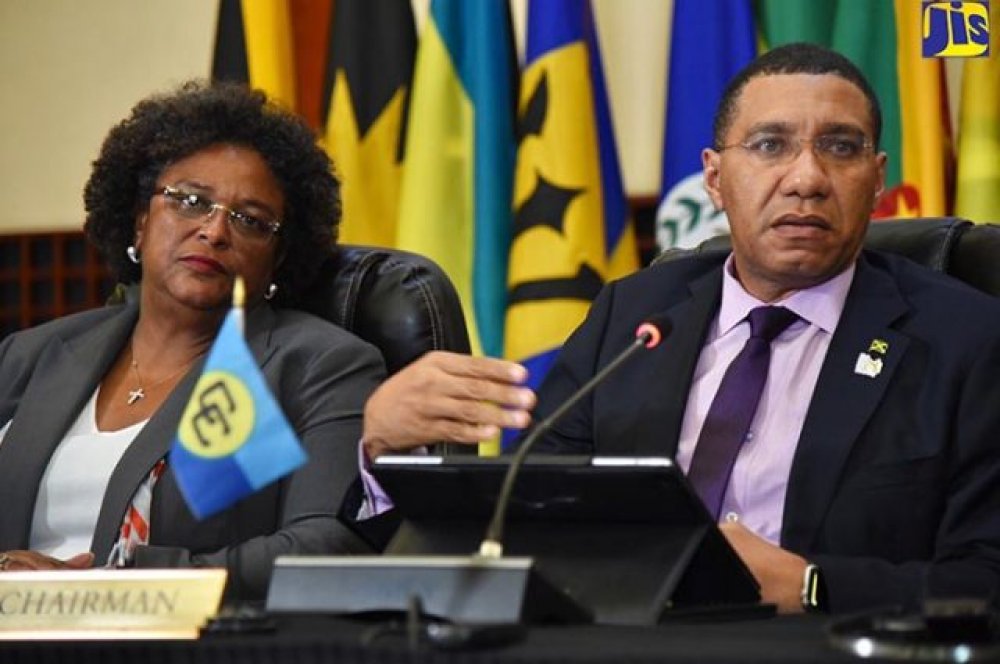 Barbados PM, the Hon. Mia Mottley, and Jamaica PM, the Most Hon. Andrew Holness, Community Chair, at the Press Conference at the end of the 39th Heads of Govt. Meeting (Photo via JIS)